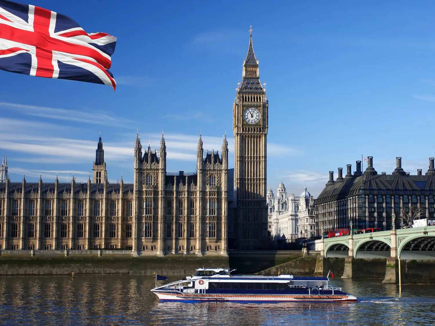 London Parliament with flag and boat