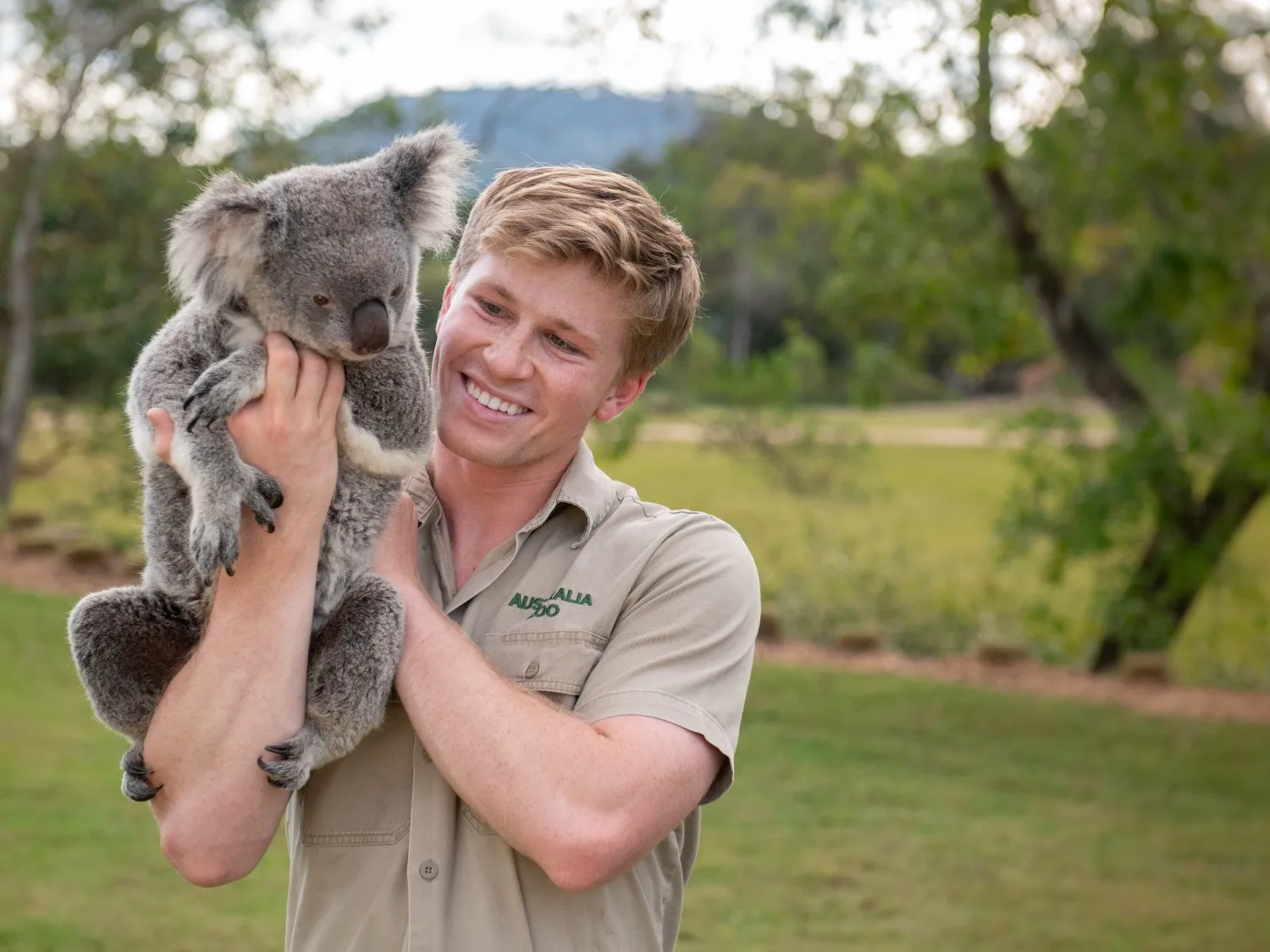 Robert Irwin with koala