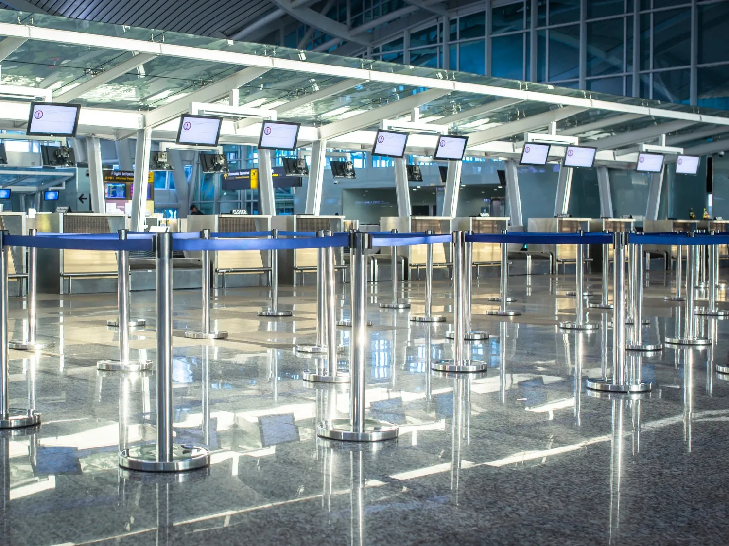 Empty check-in desks at the airport during Covid