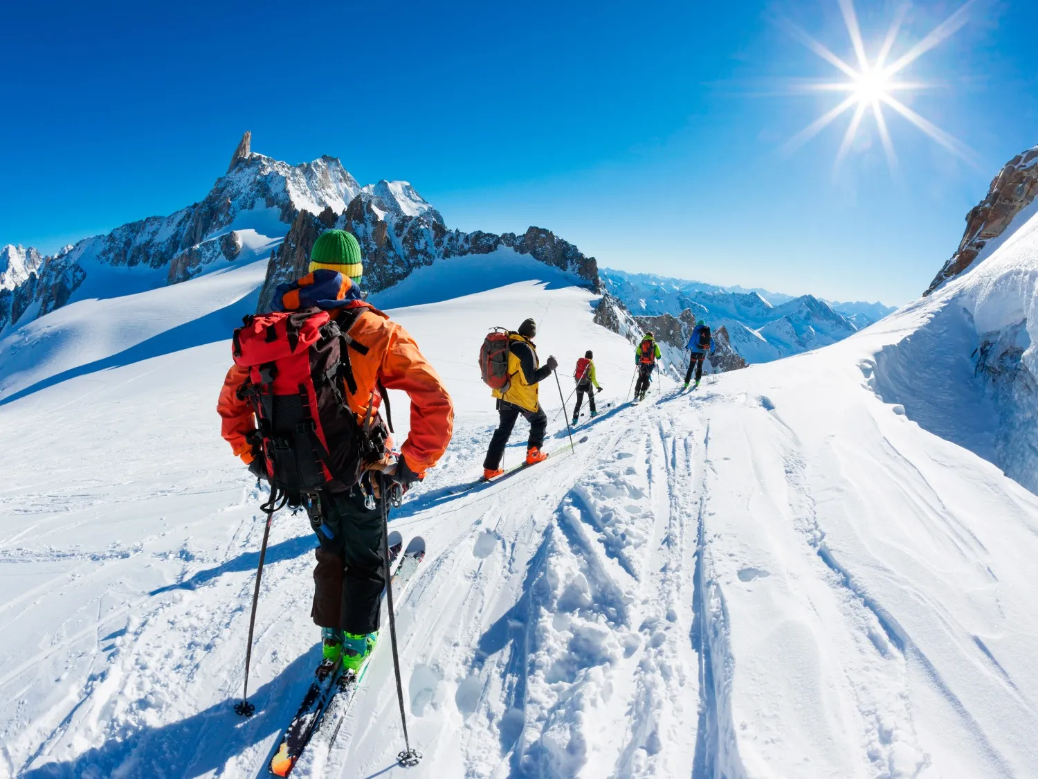 Skiers at the top of a mountain