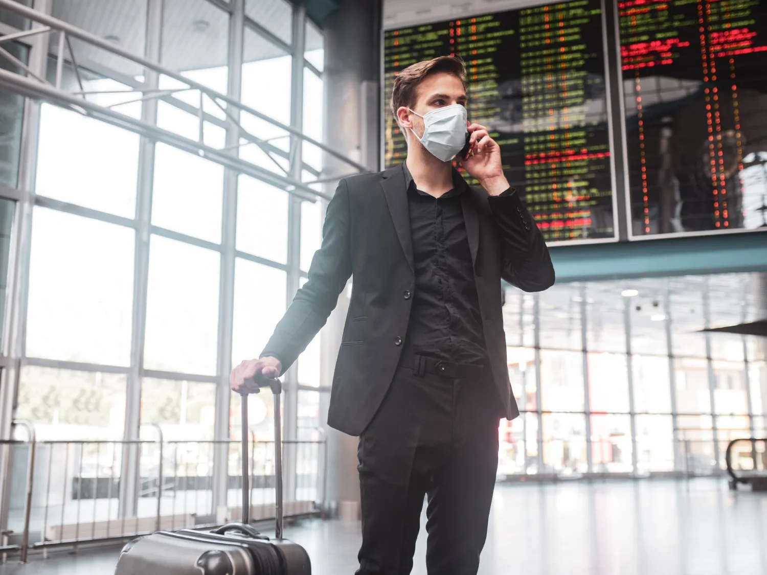 Man at an airport during Covid
