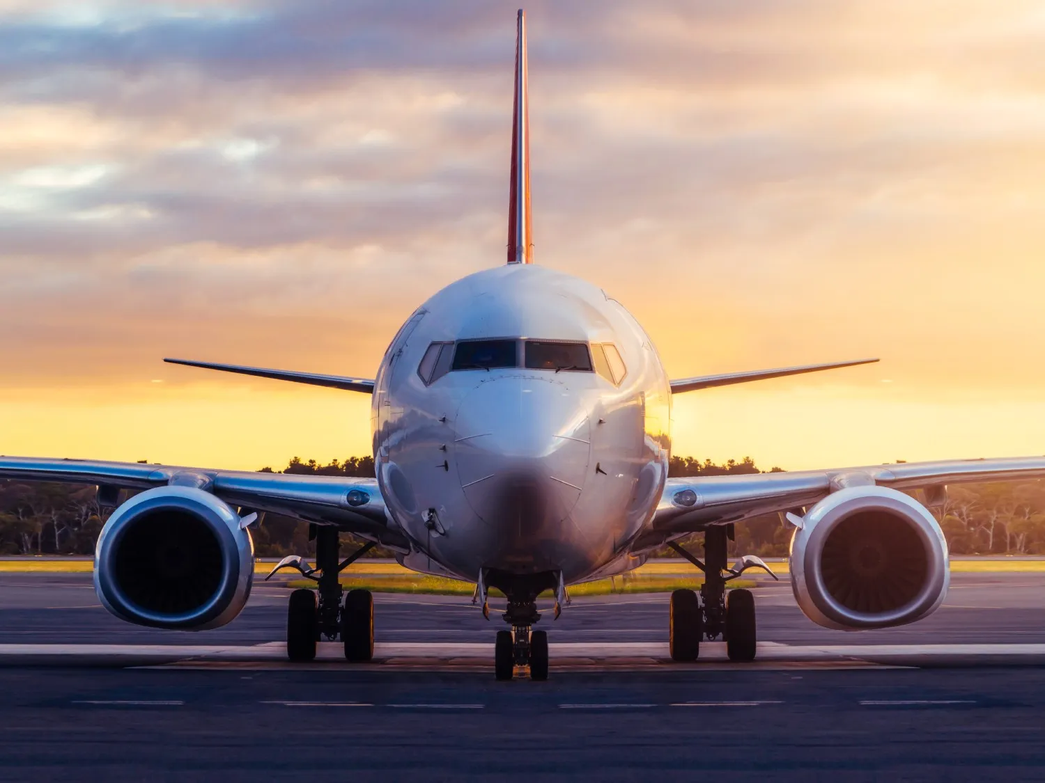 Sunset view of airplane on airport