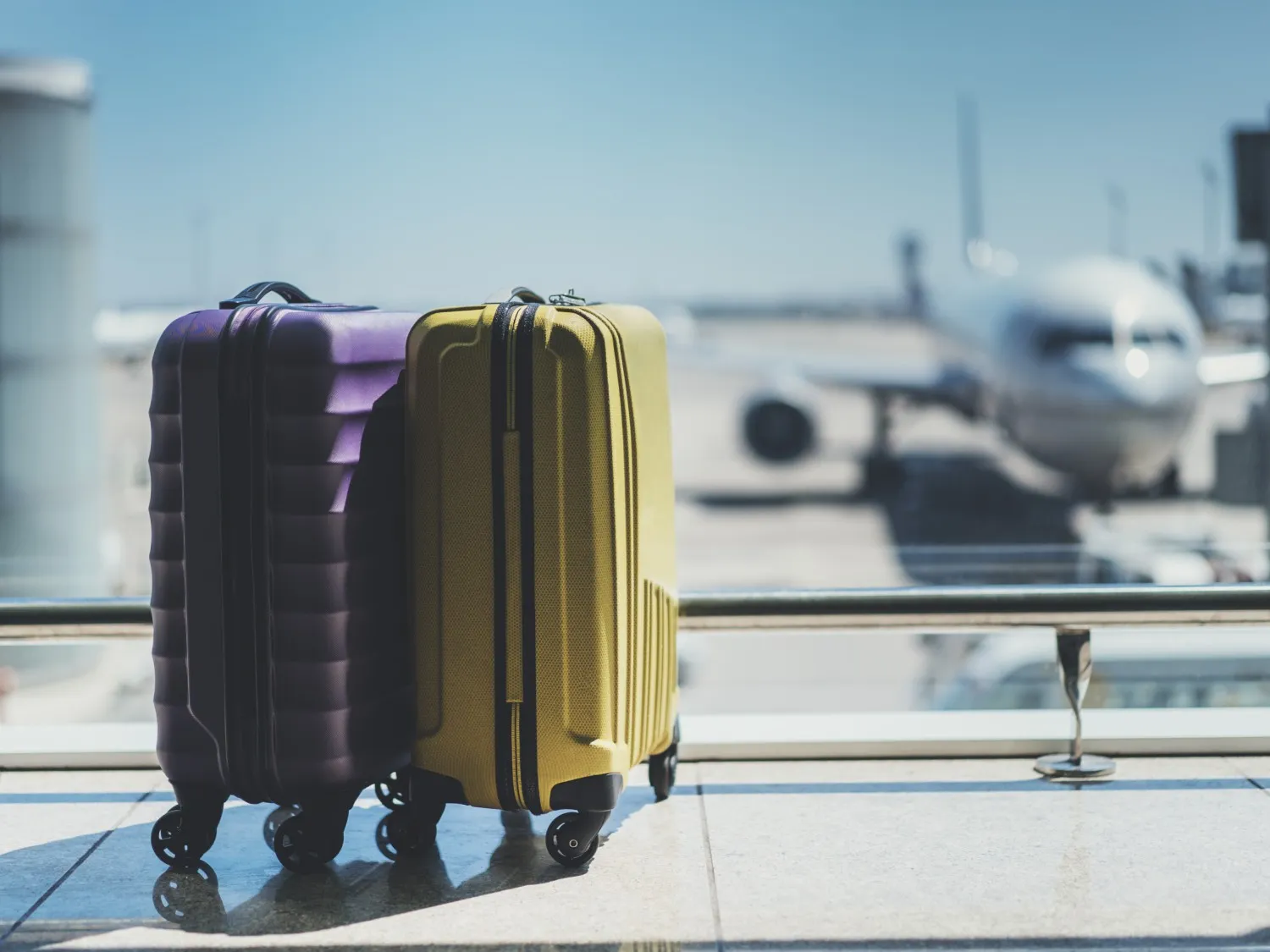 Suitcases in airport departure lounge