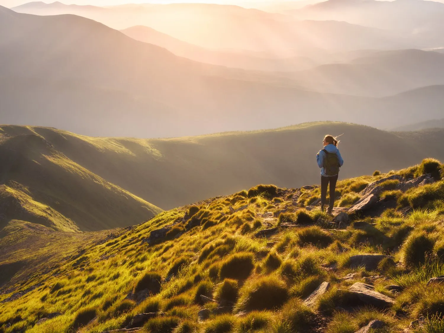 Hiking in the mountains with a beautiful sunset
