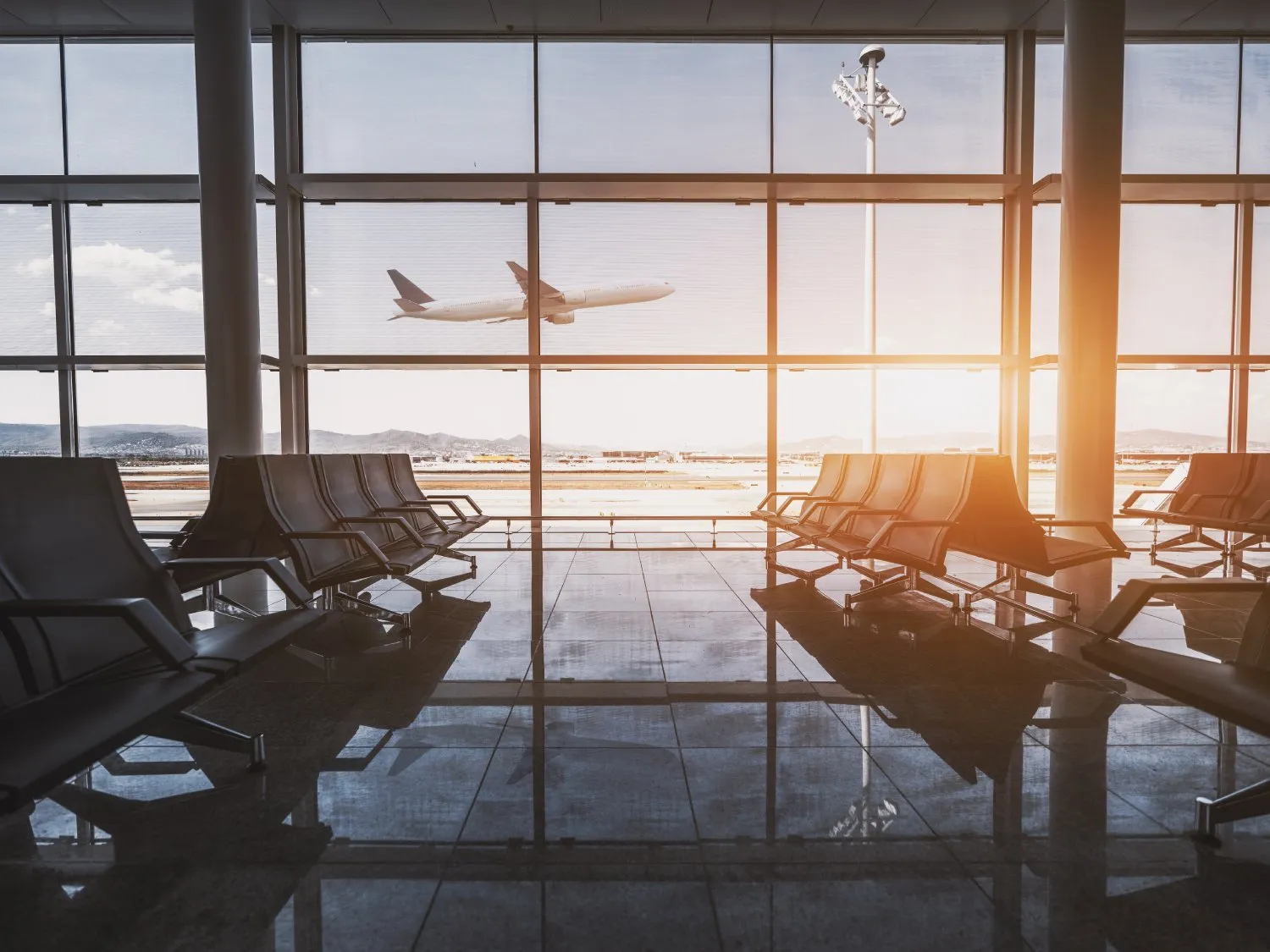 Plane taking off - Airport waiting area